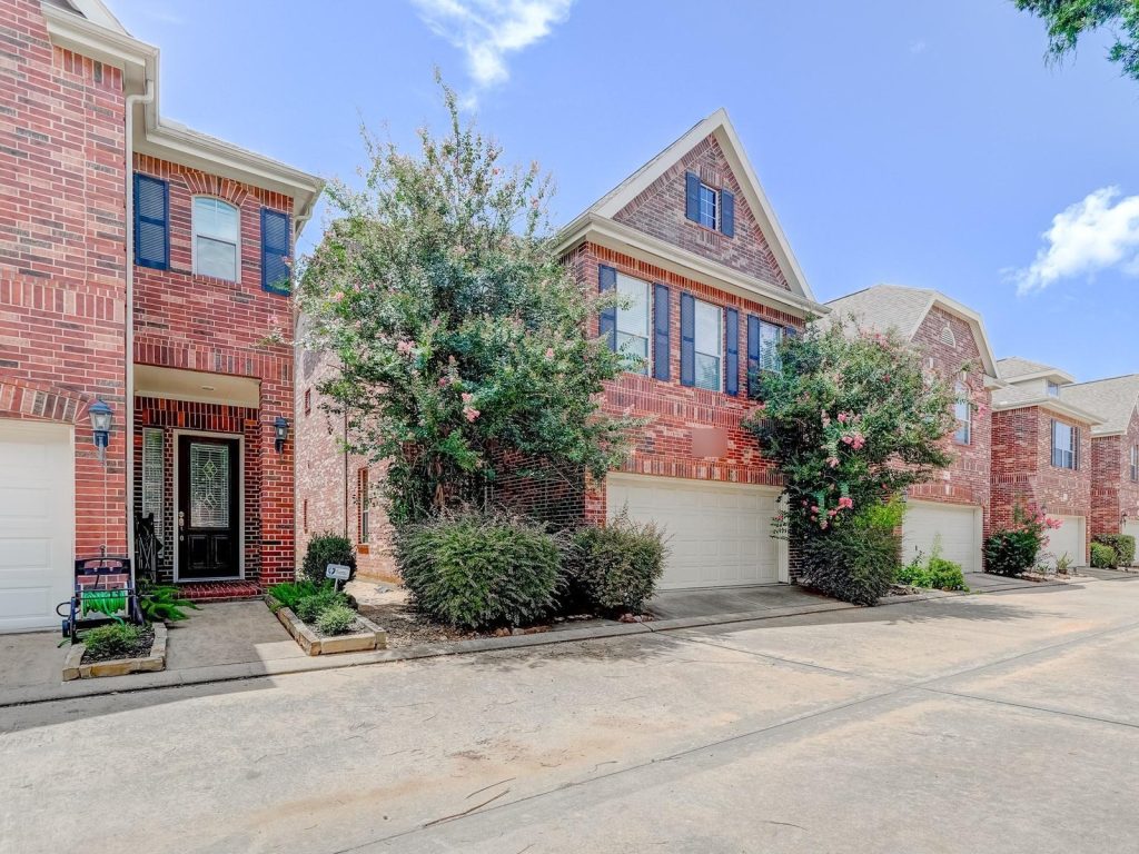 Gated brick home community in west Houston TX where the property was bought for cash