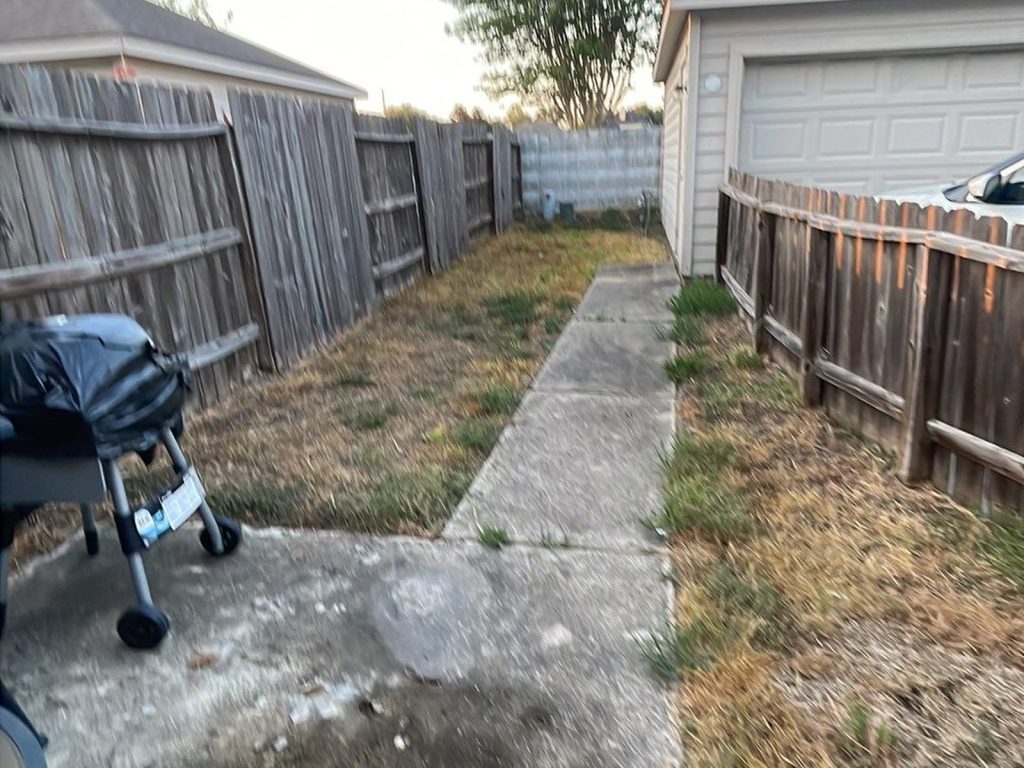 Small backyard patio at a Canyon Lakes townhome in Cypress, TX