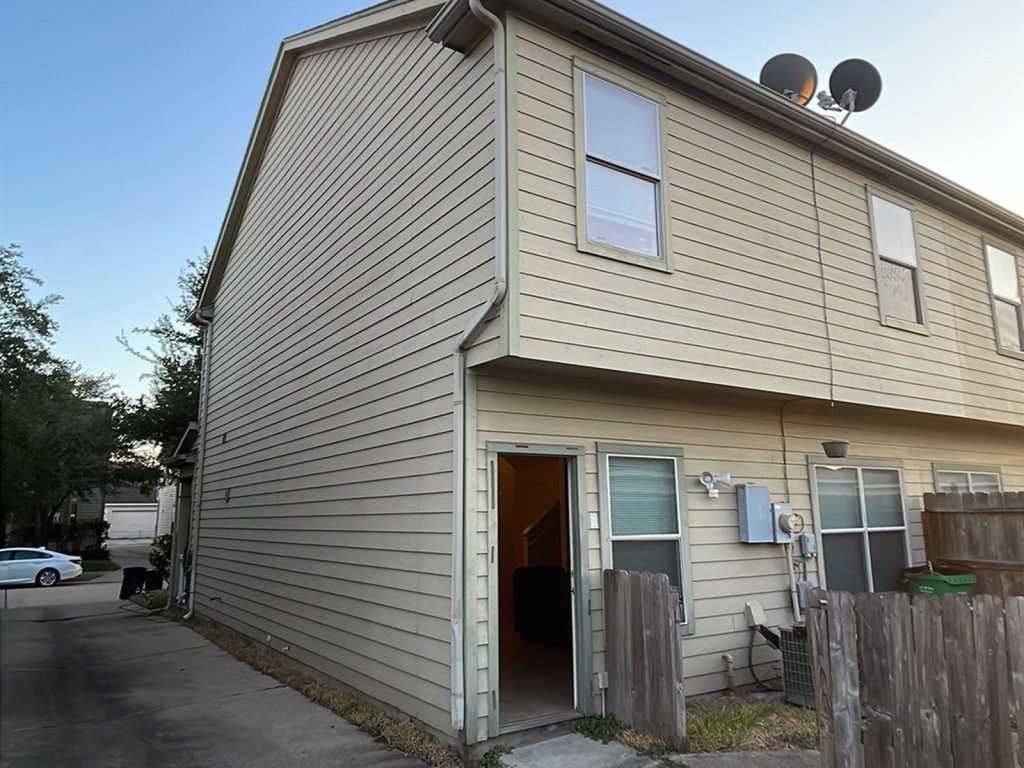 Side exterior of a Canyon Lakes townhome in Cypress, TX