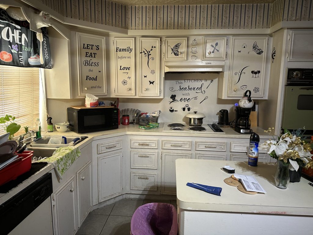 Kitchen in an inherited Quail Valley East home in Missouri City, TX