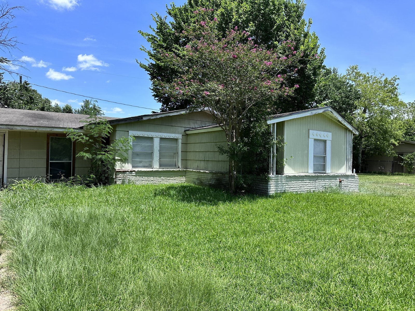 Vacant inherited home with overgrown yard bought for cash in South Park, Houston TX