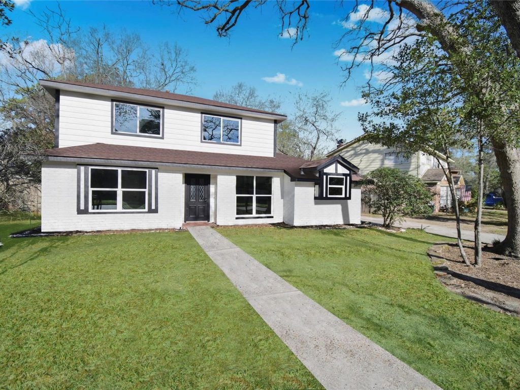Front angle view of a Kingwood, TX rental home purchased with tenants in place