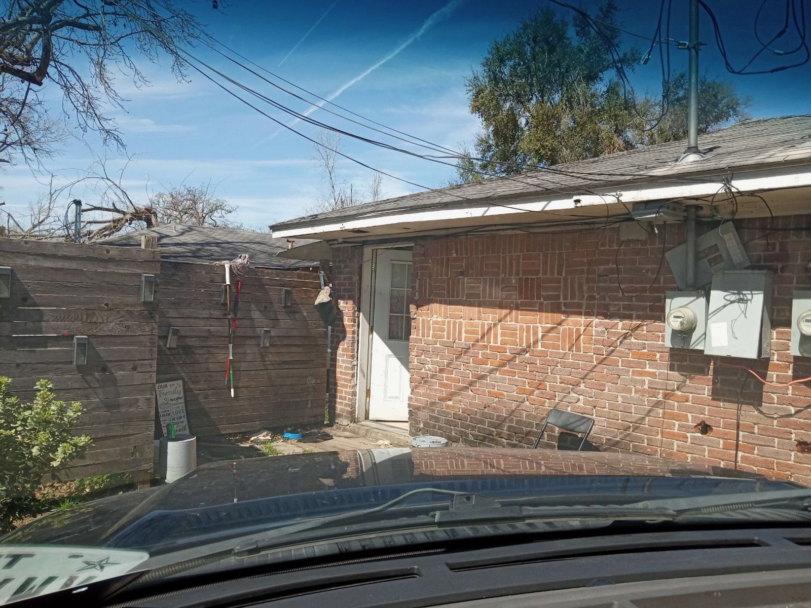 Brick exterior of an aging multifamily rental in Trinity Gardens, Houston TX bought for cash