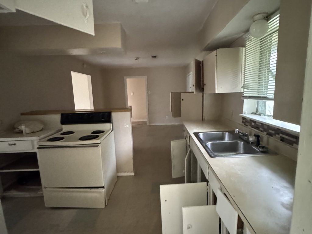 Dated original kitchen in inherited Houston TX home purchased as-is for cash