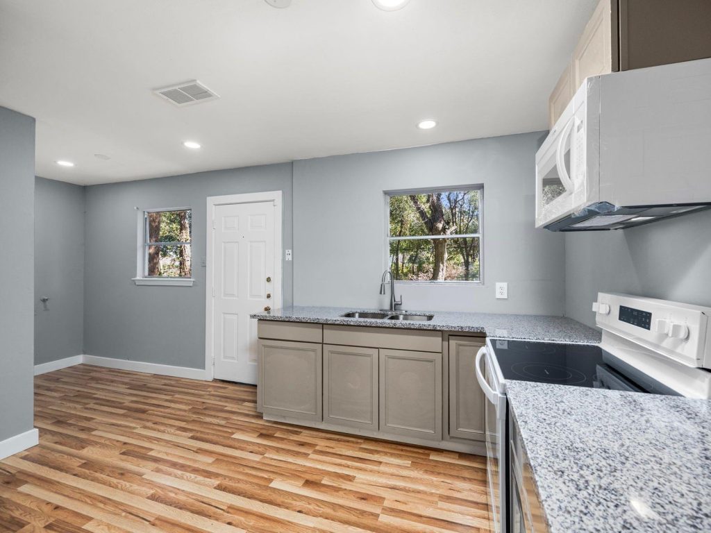 Updated kitchen after renovation of Houston TX house purchased as-is for cash