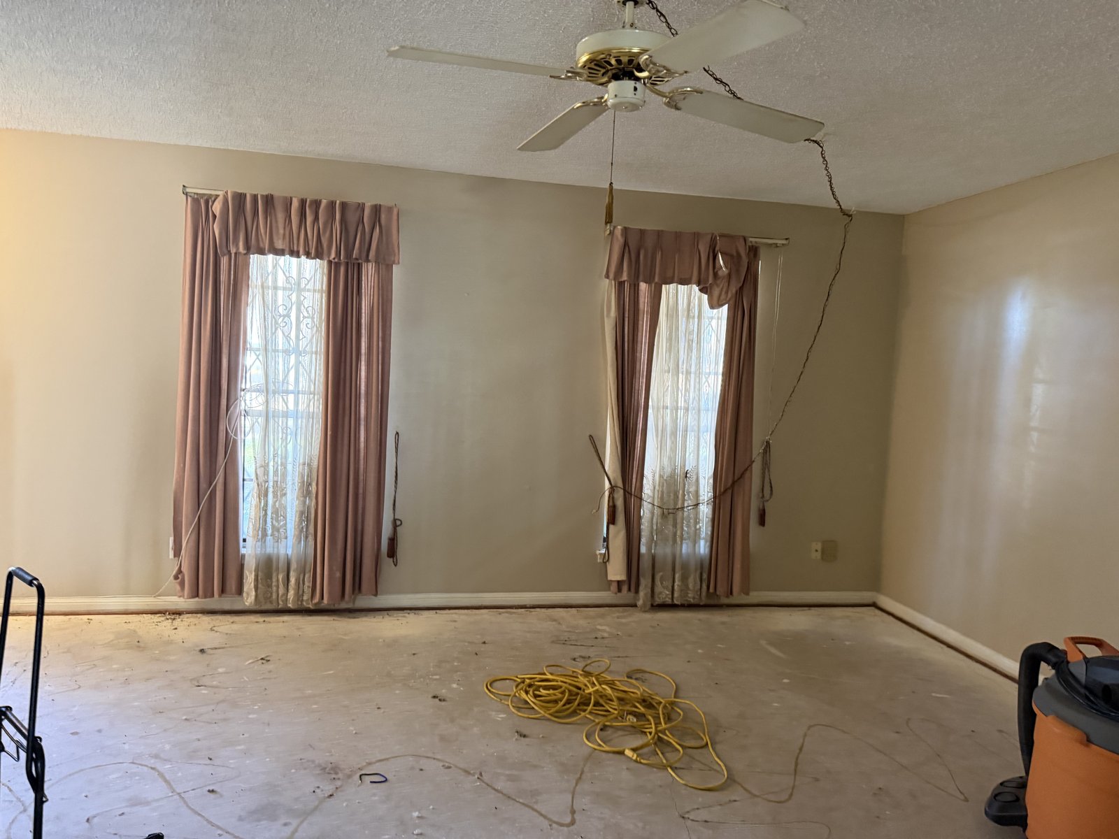 Stripped living room in an abandoned home bought for cash in Spring Shadows, Houston TX