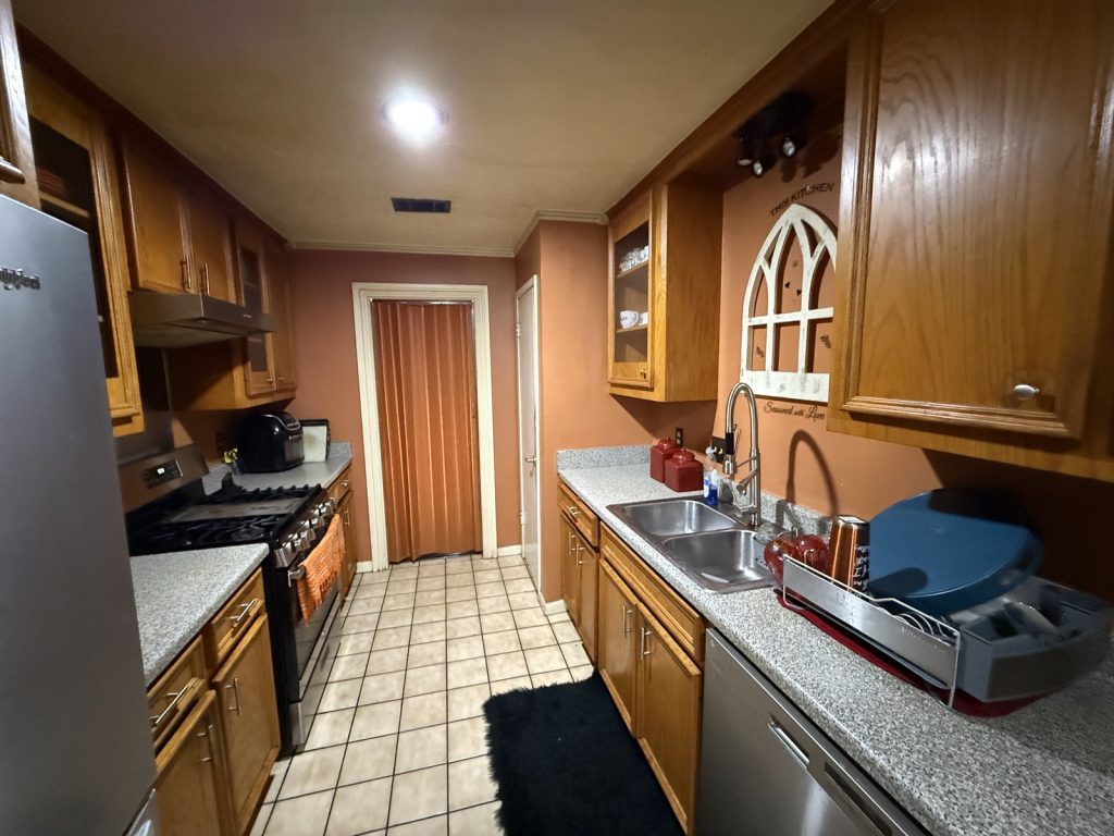 Updated galley kitchen in Mission Bend Houston TX home sold before foreclosure