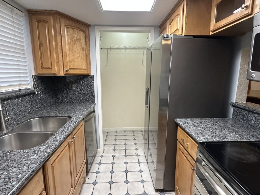 Kitchen with walk-in pantry in a South 8th Street rental townhome, La Porte TX