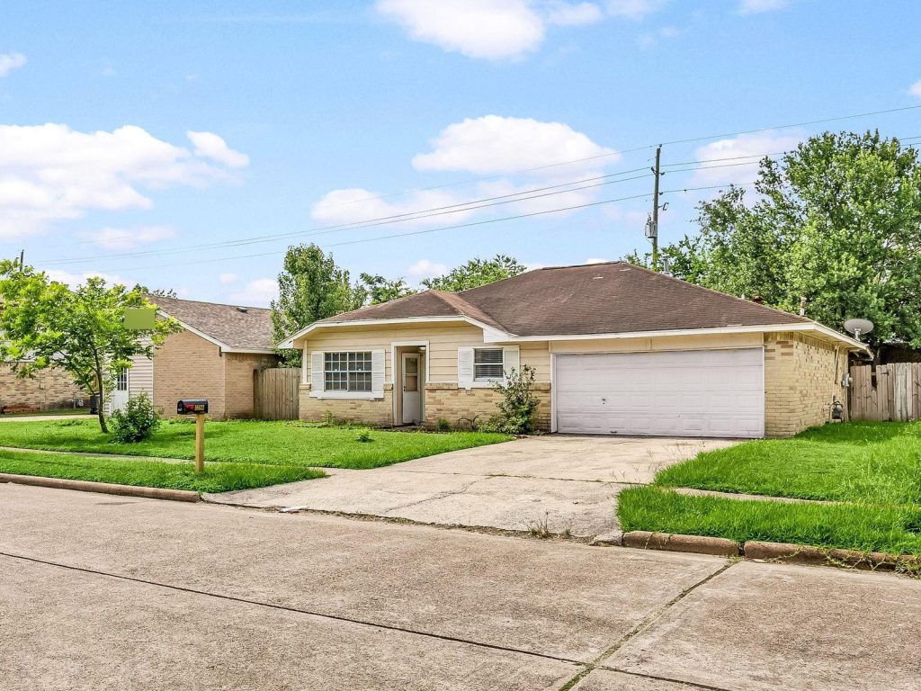 Daytime front view of a Spinney Lane rental home in Cypress, TX