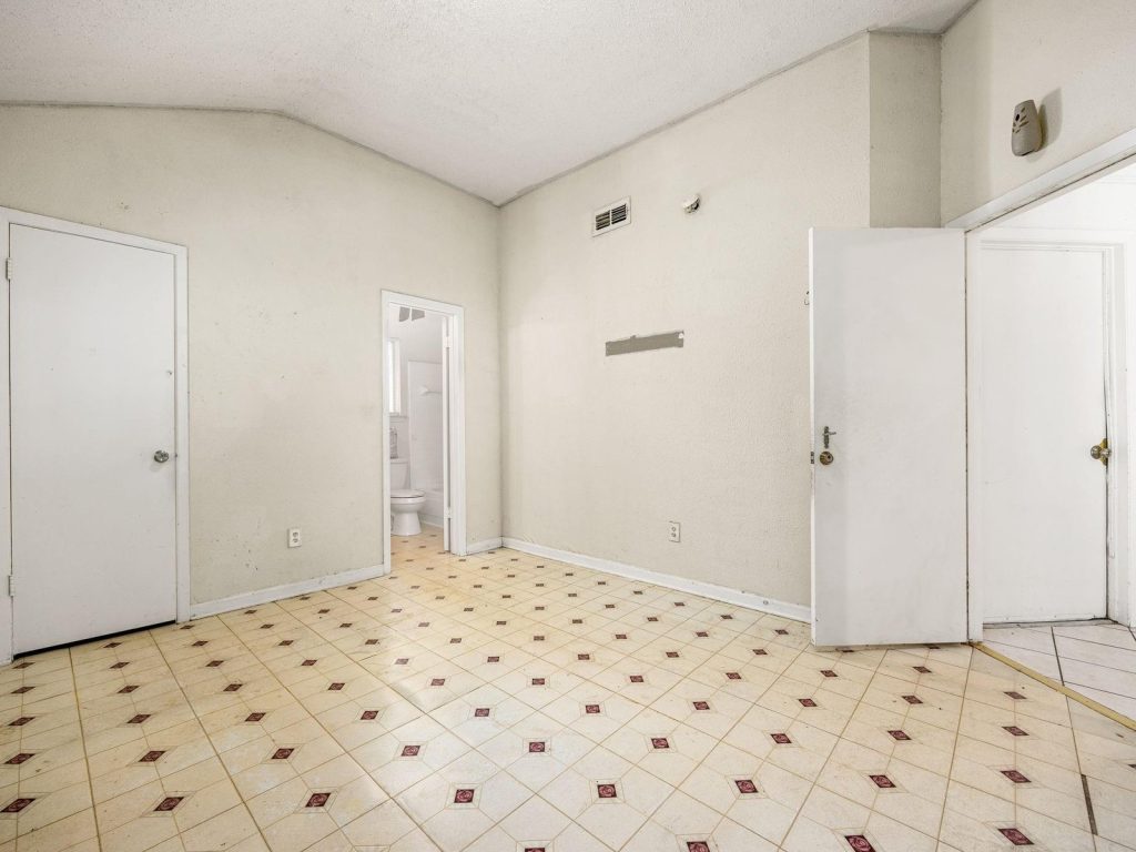 Dated kitchen in a Paddock, Cypress TX rental sold as-is