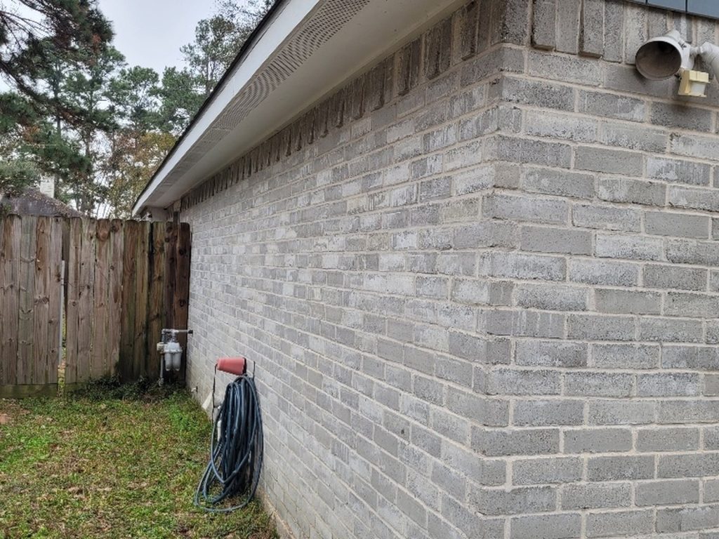Brick exterior corner at a Charterwood home in Spring, TX purchased for cash