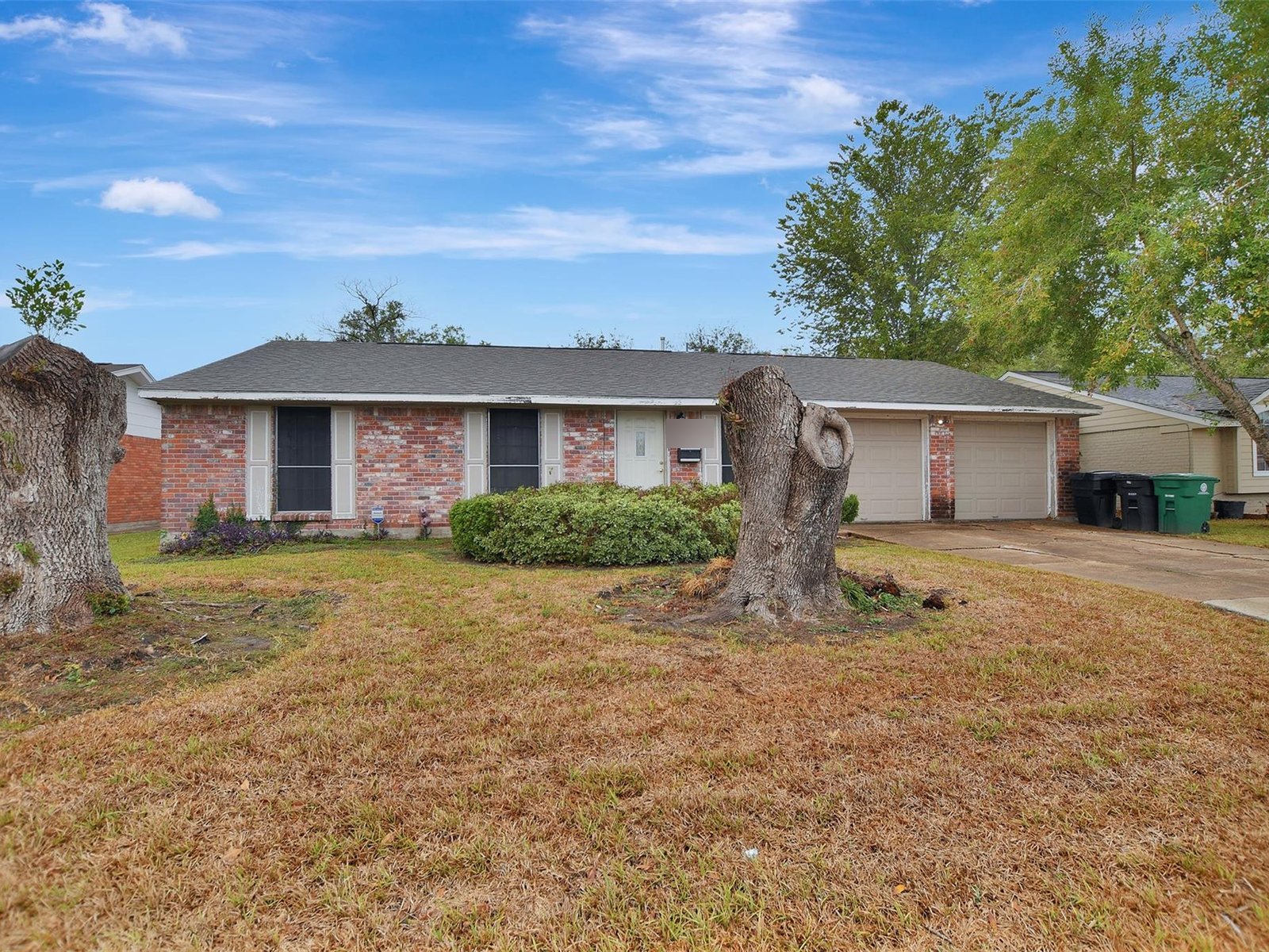 Front of inherited brick ranch home bought for cash in Southglen, Houston TX