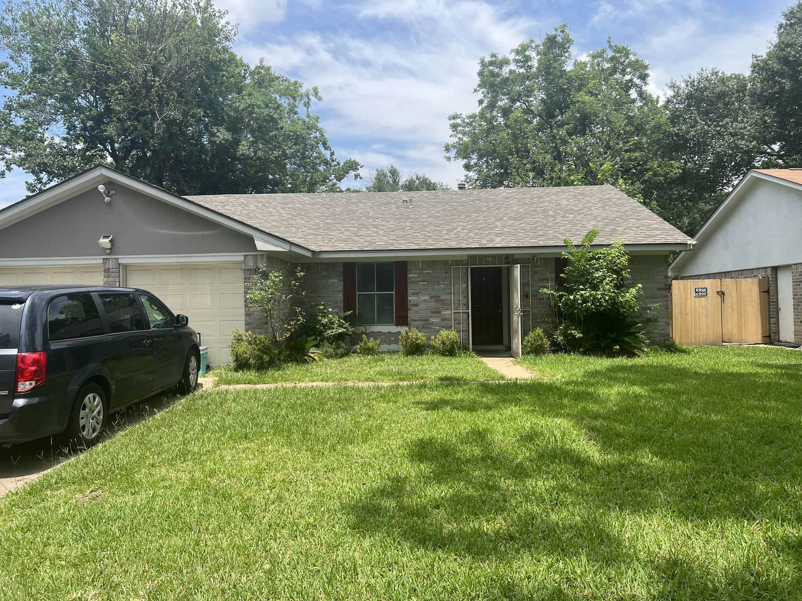 Front view of as-is rental home bought for cash in Northwest Park, Houston TX