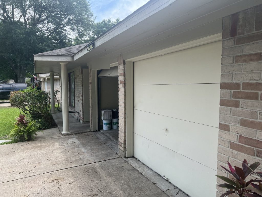 Covered entry and garage of Northwest Park Houston TX rental sold as part of a portfolio