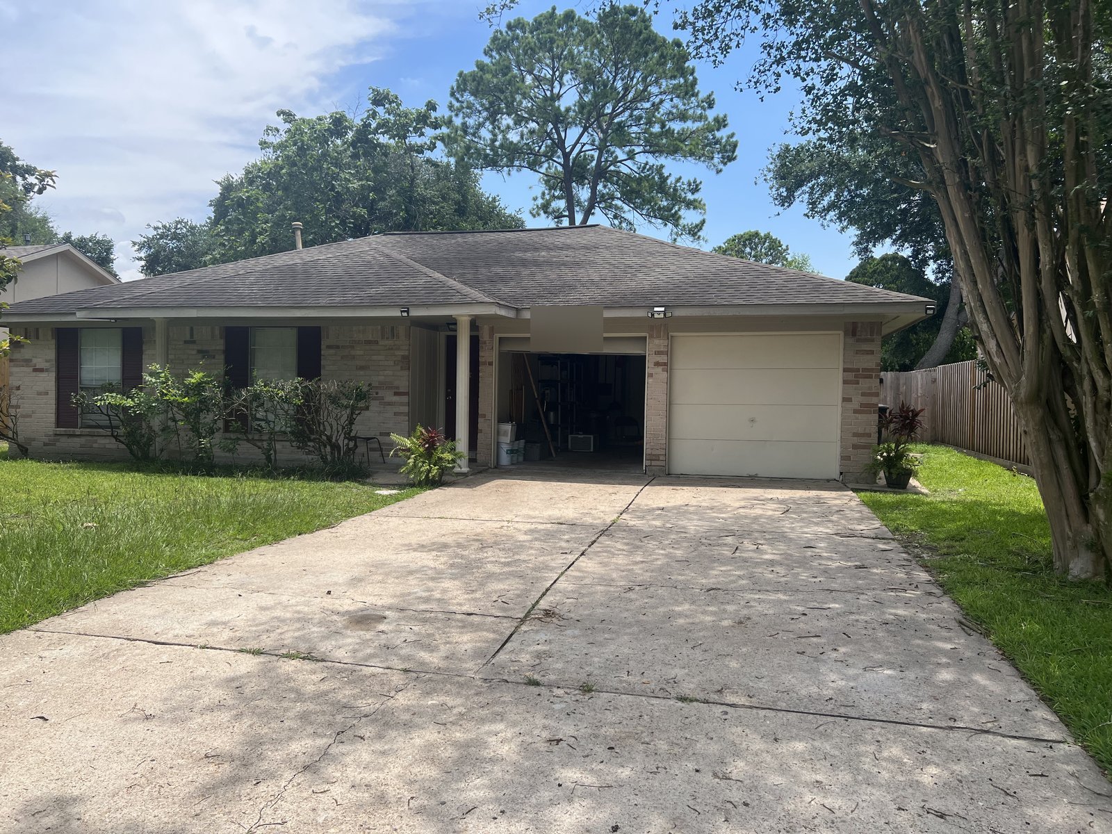 Front view of rental home bought for cash in Northwest Park, Houston TX